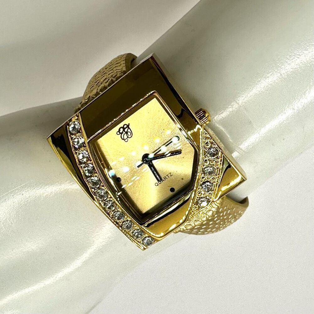 Vintage Elizabeth Taylor gold tone rhinestone watch